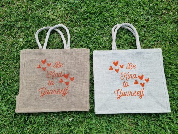 be-kind-both Large jute tote bags with Heartfelt uplifting “Be Kind to Yourself” design - 2 bag colours – eco-friendly, reusable, and perfect for shopping. Shipping across Australia. Bulk custom print available.